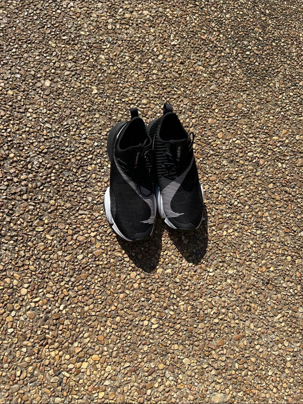 Nike Black Slip-On Sneakers with White Swoosh - Men